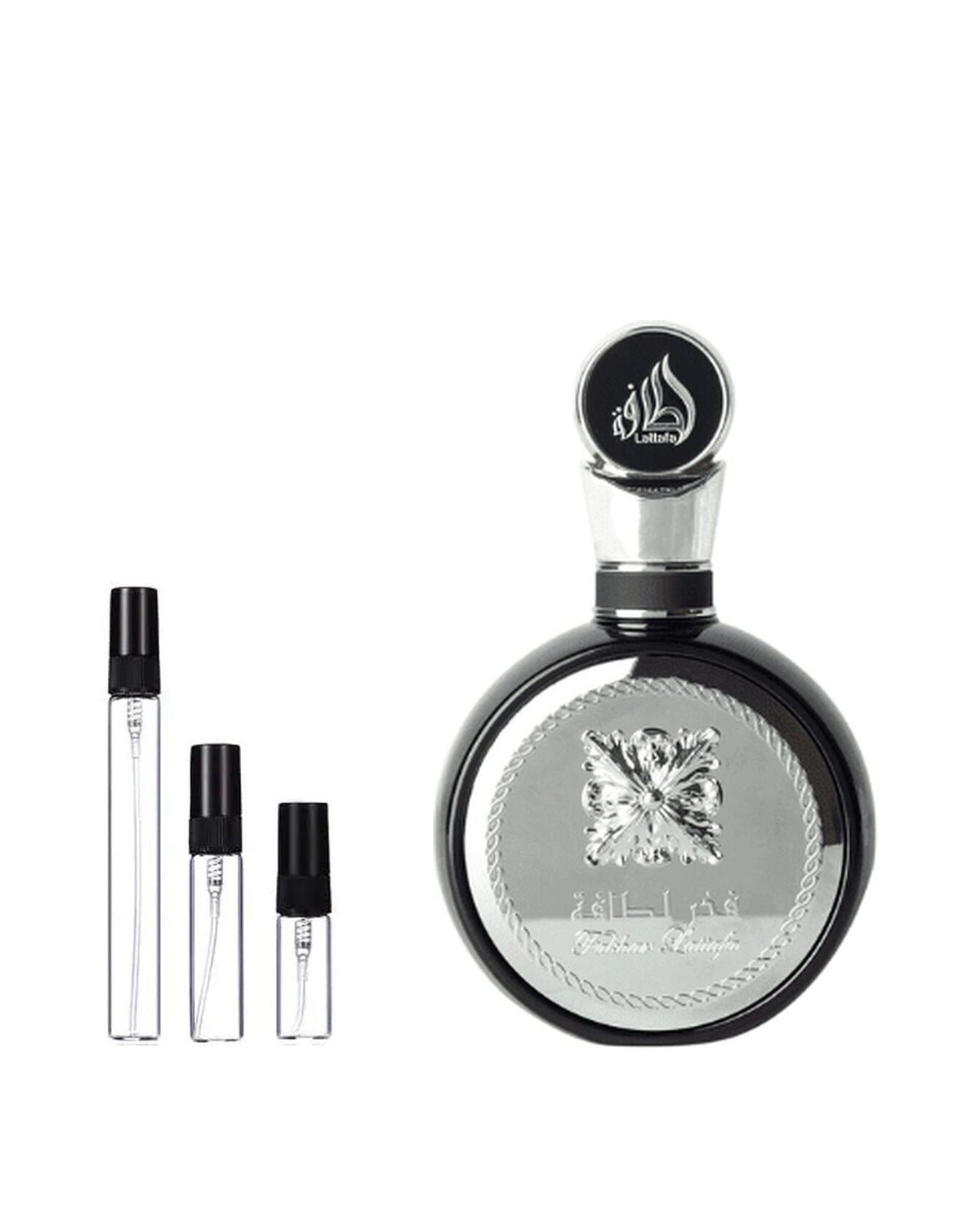 Lattafa Fakhar Black sample – decant naast de volle fles ter herkenning